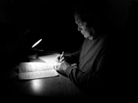 After an early morning (5am) wake up, David McCarthy, an Air Force veteran writes in his daily journal early in the morning before anyone else is up at the Veterans Transition House in New Bedford, MA.  The Veterans Transition house is non-profit and provides shelter and supportive services to veteran's who are homeless or who are dealing with addiction.  In the last month, two veterans have died from overdoses at the VTH.   PHOTO PETER PEREIRA